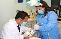 Samaritan dental arts doctor and assistant doctor along with patient picture